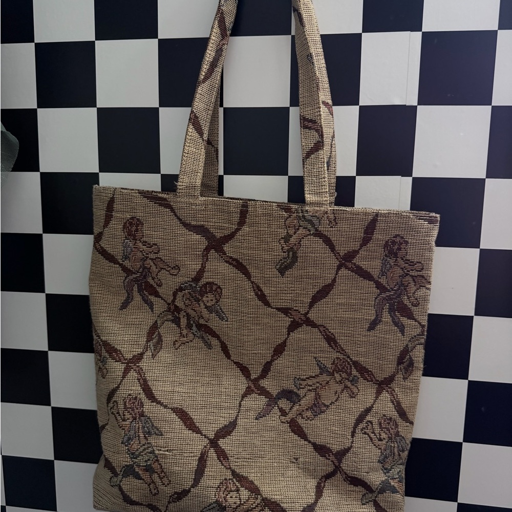 Elegant Beige Tote Bag with Cherub Design